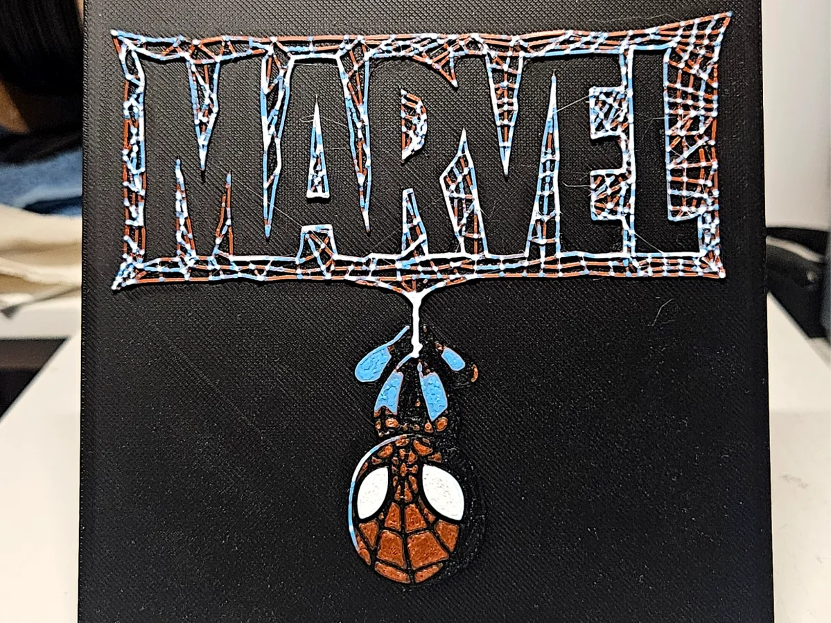 Spiderman hanging down