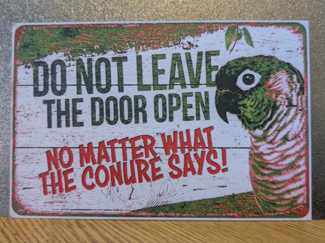 Conure door sign