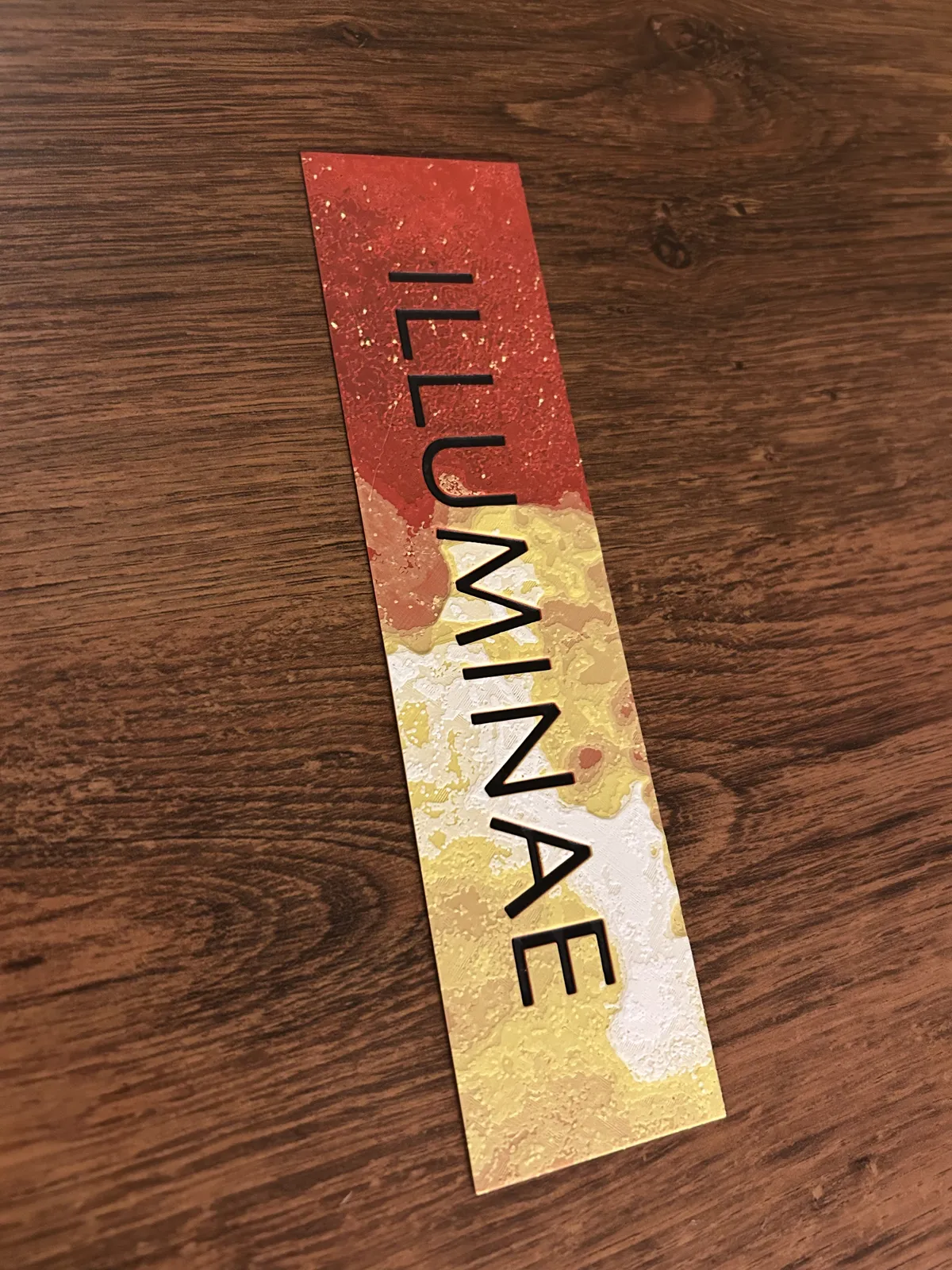 Bookmark for the book "ILLUMINAE"
